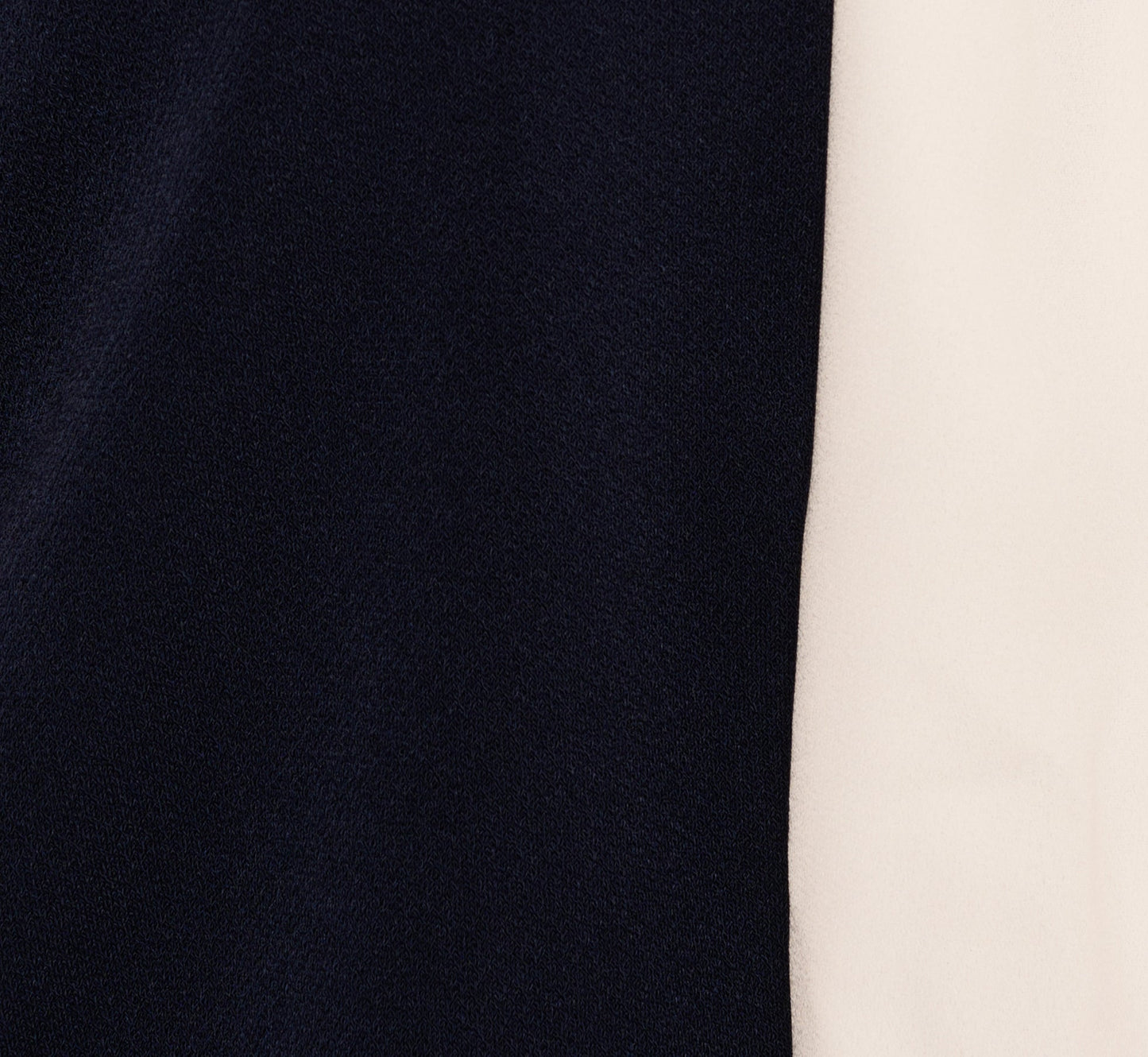 Flutter Sleeve Tie Neck Knit Top In Navy Ivory