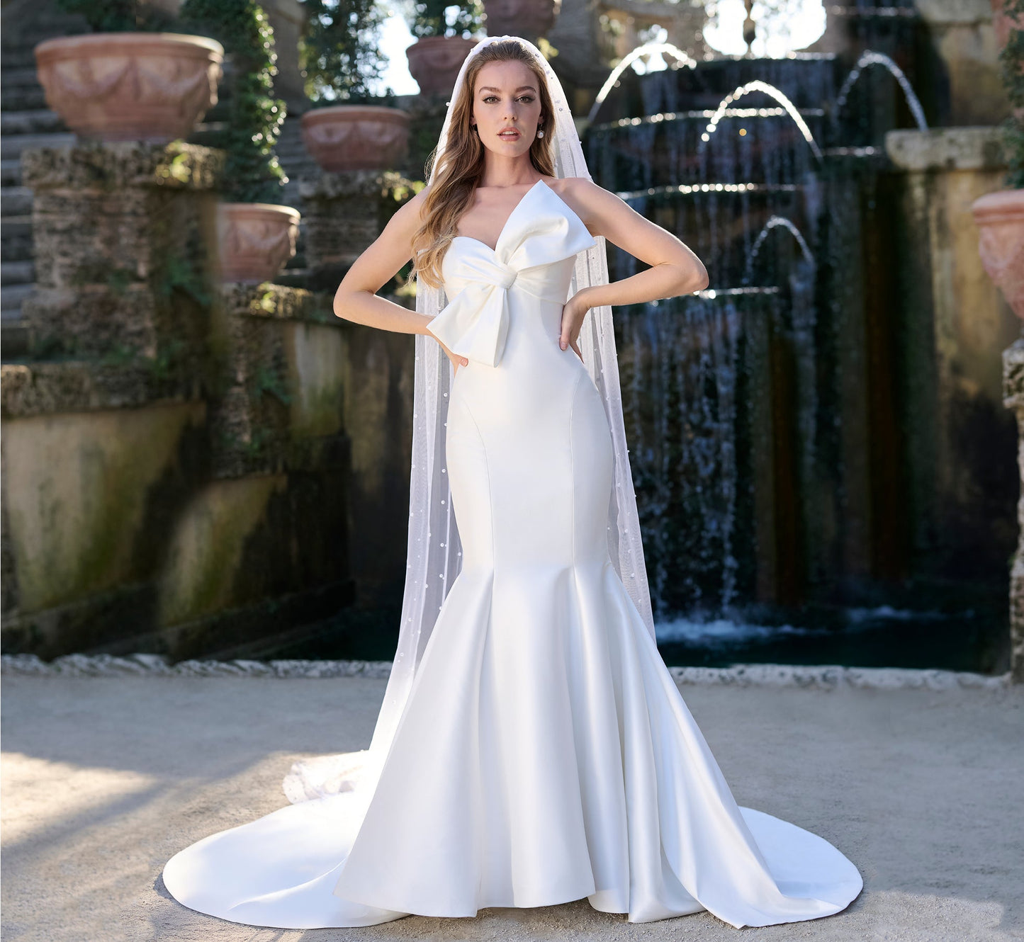 Stretch Mikado Mermaid gown with draped bow in Ivory