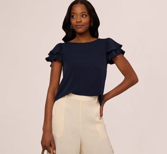 Double Flutter Sleeve Top With Pleated Details In Blue Moon
