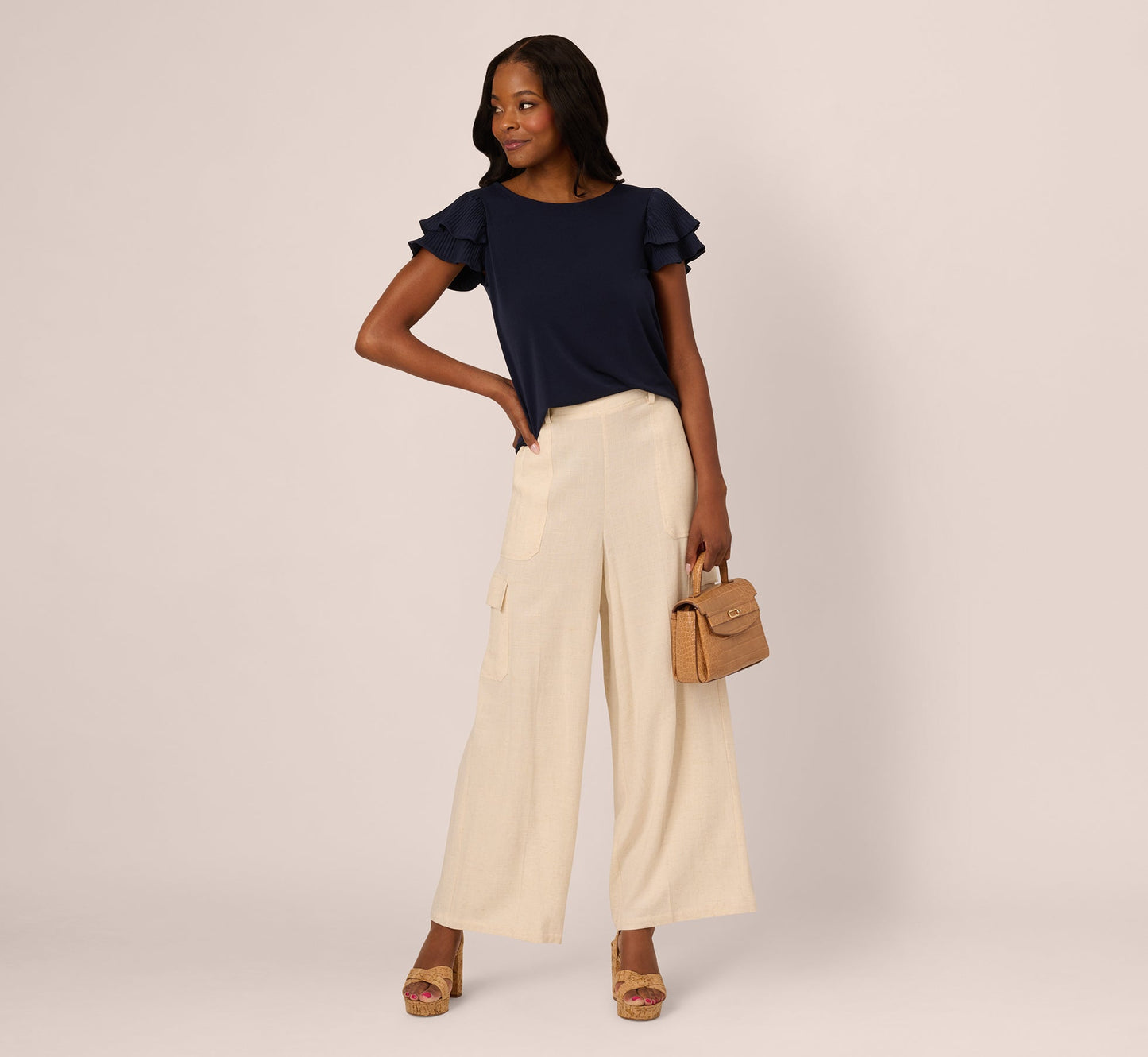 Double Flutter Sleeve Top With Pleated Details In Blue Moon