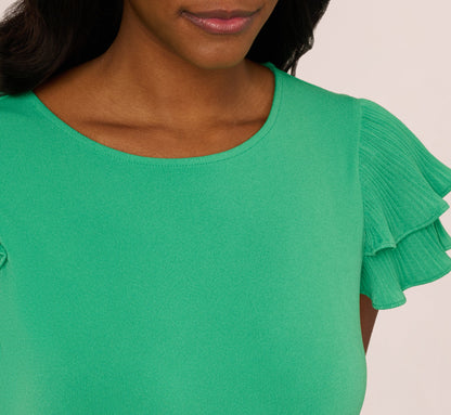 Double Flutter Sleeve Top With Pleated Details In Jelly Bean