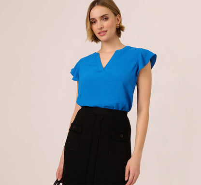 Flutter Sleeve Top With Notched Neck In Egyptian Blue