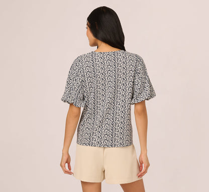 Bubble Sleeve Printed Tie Waist Top In Navy Stencil