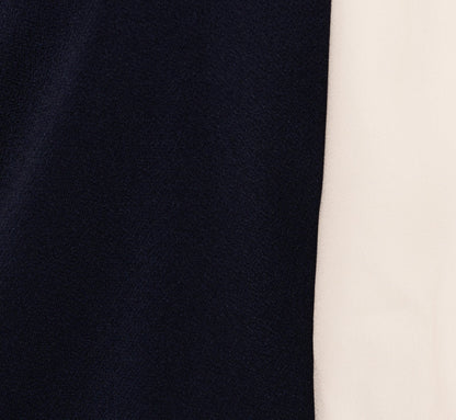 Flutter Sleeve Tie Neck Knit Top In Navy Ivory