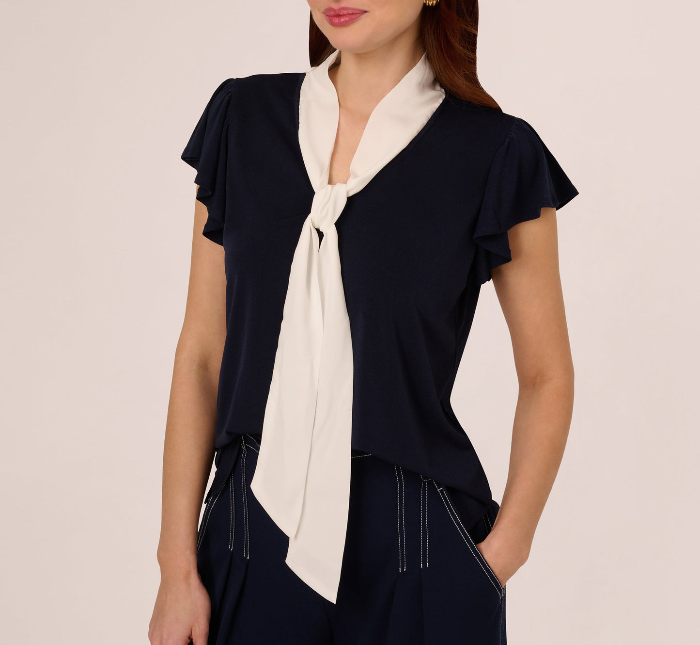 Flutter Sleeve Tie Neck Knit Top In Navy Ivory