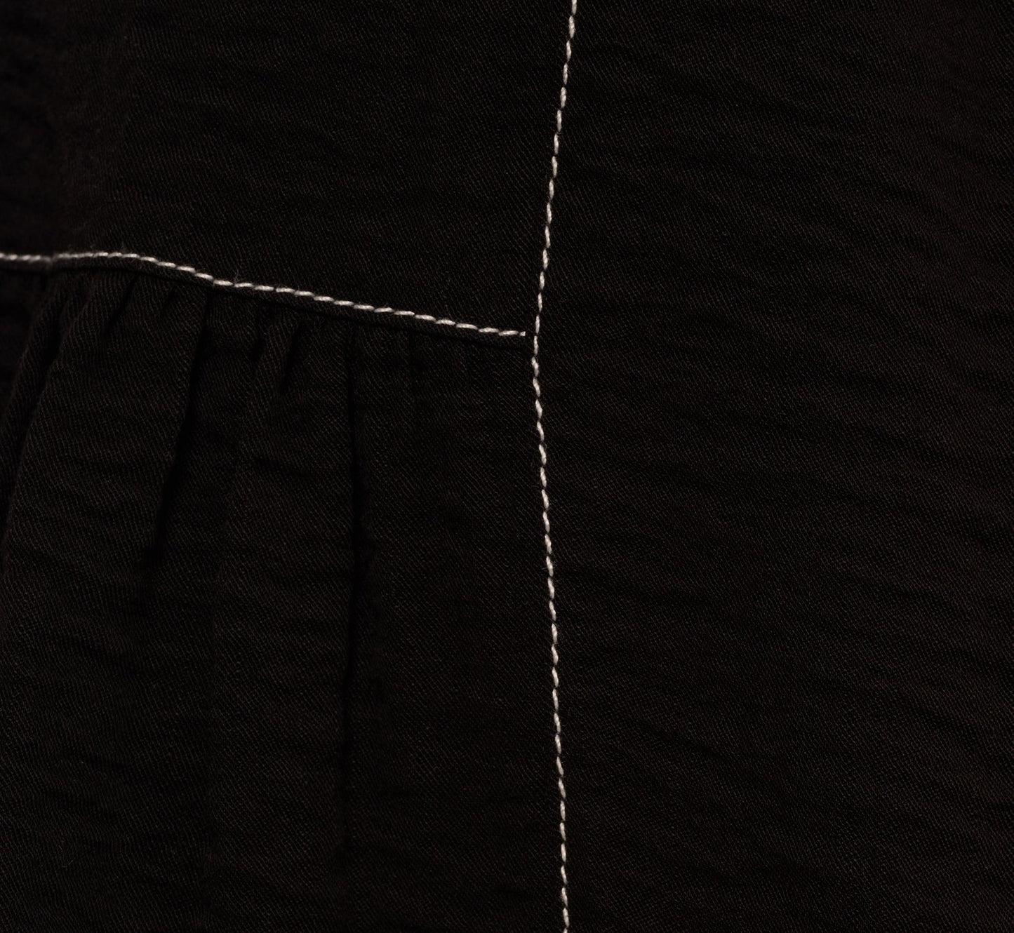 Extended Shoulder Contrast Stitch Yoke Top In Black Ivory