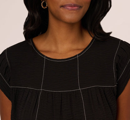 Extended Shoulder Contrast Stitch Yoke Top In Black Ivory