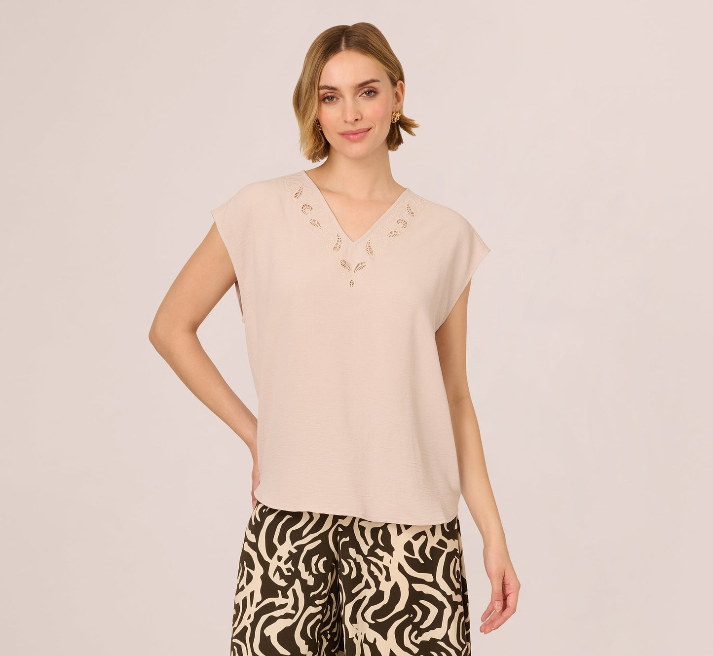 Sleeveless Embroidered V Neck Top In Pebble