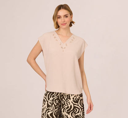 Sleeveless Embroidered V Neck Top In Pebble