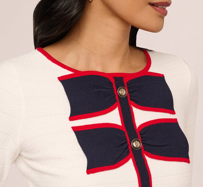 Long Sleeve Contrast Tipped Bow Sweater In Ivory Navy Red