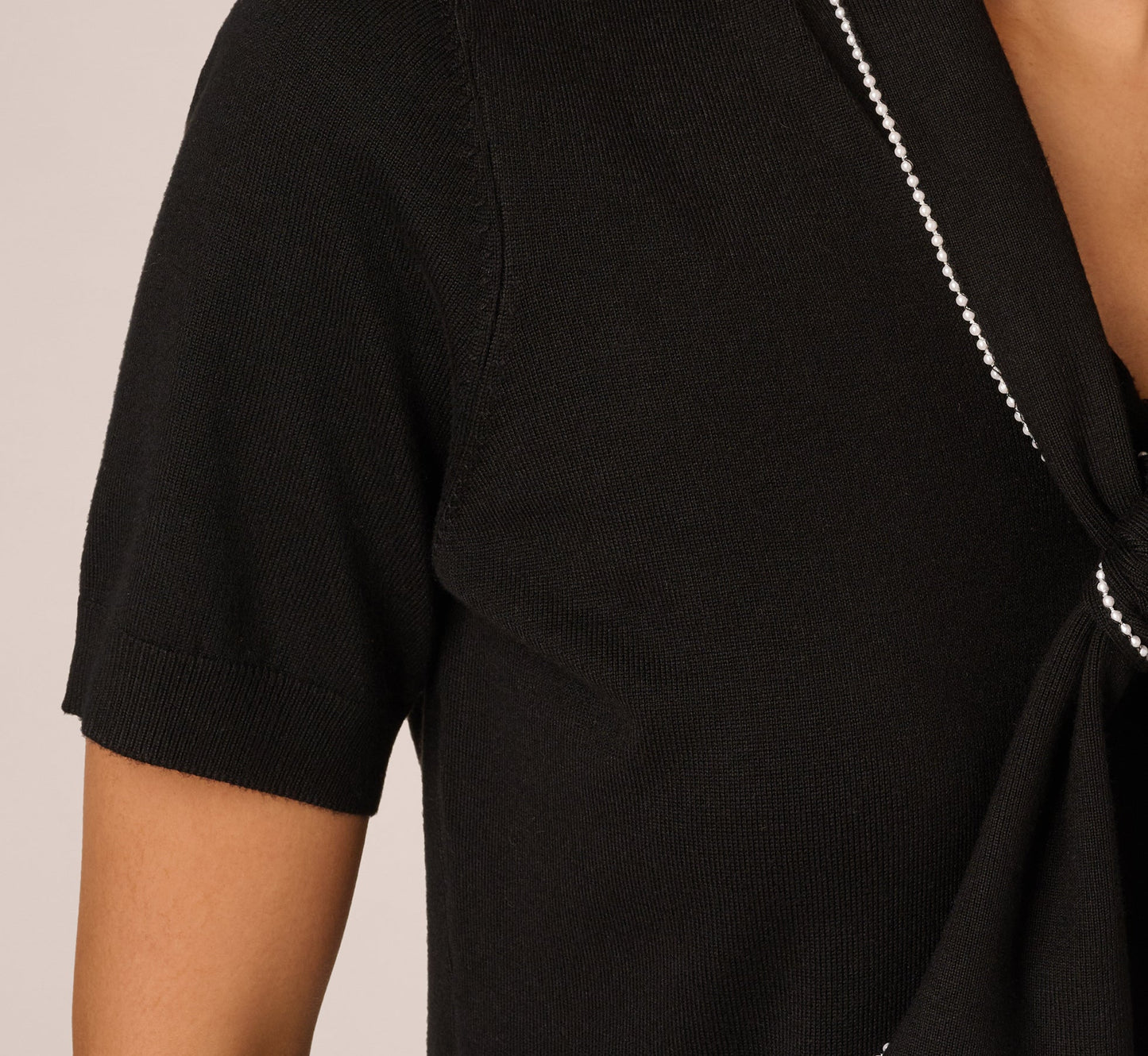 Short Sleeve Pearly Tie Neck Knit Top In Black