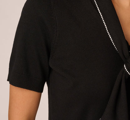 Short Sleeve Pearly Tie Neck Knit Top In Black