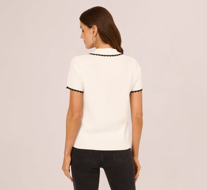 Short Sleeve Scalloped Trim Polo Sweater In Cream Black
