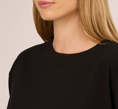 Three Quarter Sleeve Drop Shoulder Rib Knit Top In Black