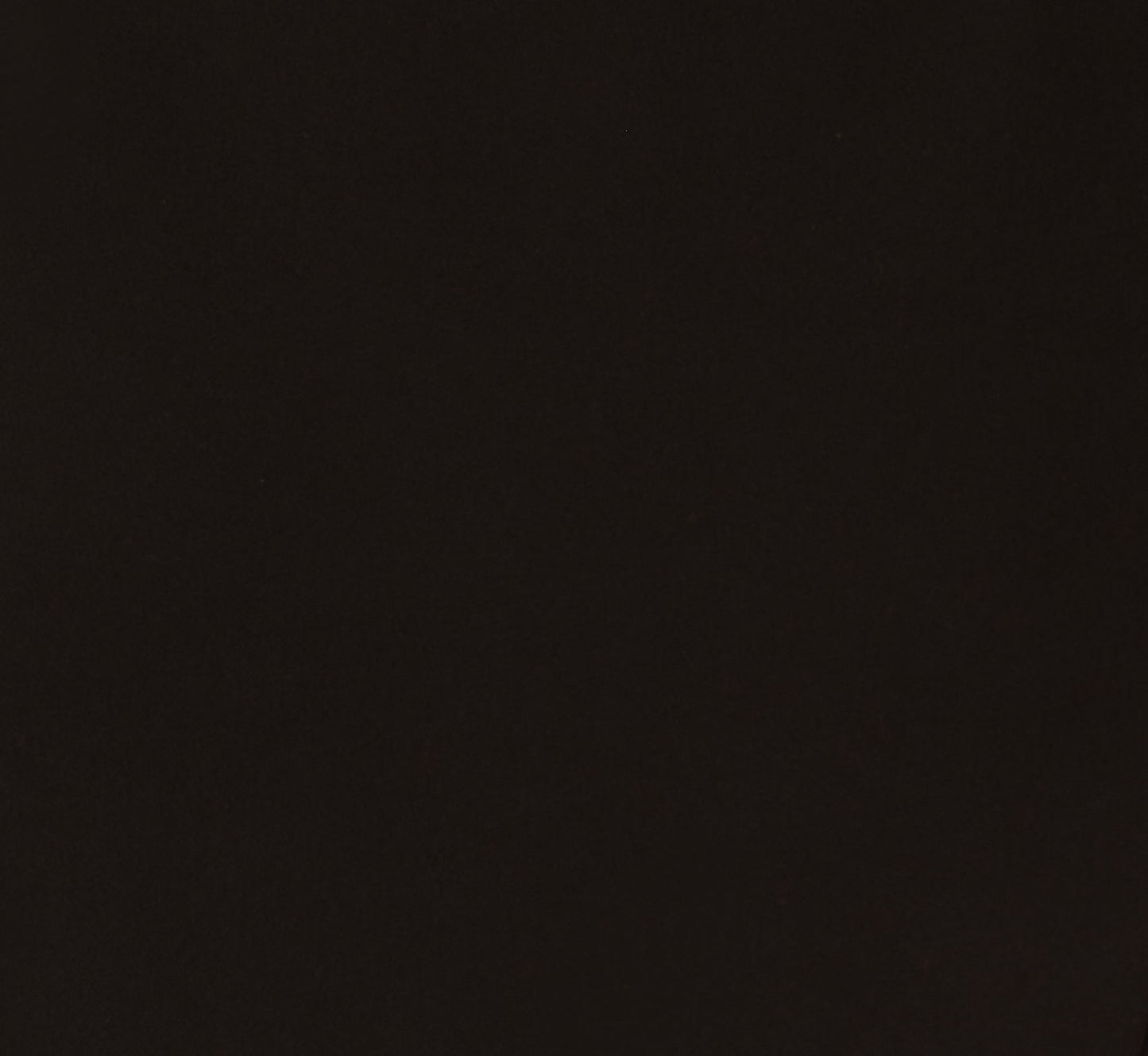 Sleeveless Romper With Peplum Hem In Black