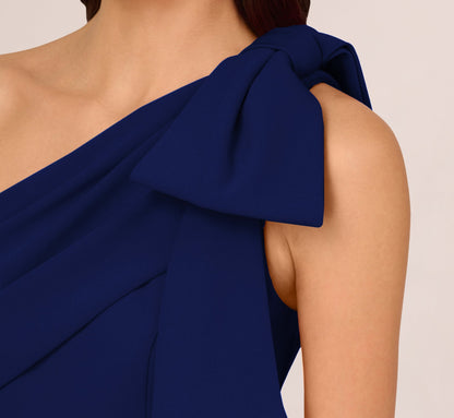 Stretch Crepe One Shoulder Mermaid Gown With Bow Accent In Navy Sateen