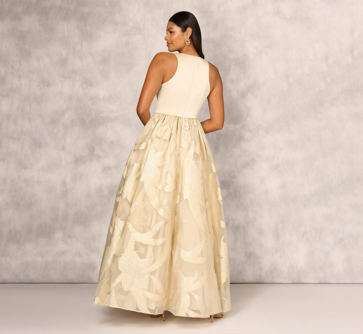 Metallic Jacquard Sleeveless Ball Gown With Crinoline Details In Light Gold