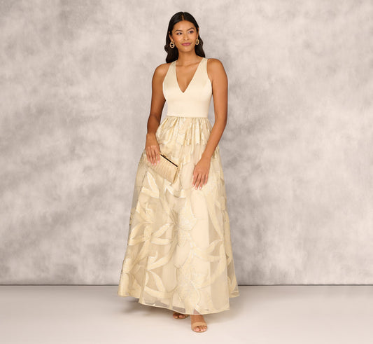 Metallic Jacquard Sleeveless Ball Gown With Crinoline Details In Light Gold